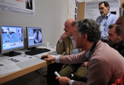Surgeons in Davos, Switzerland, get to grips with the PC version of the virtX training package. Oliver Bott is seated on the left.