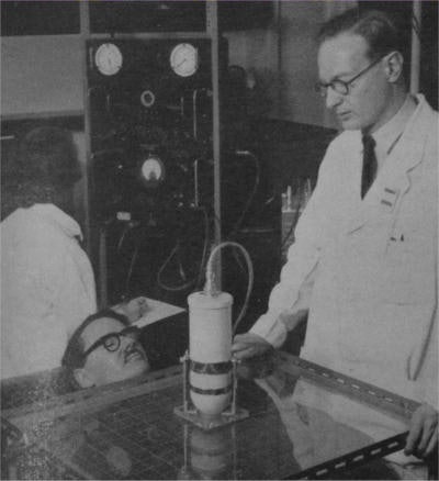 Keith Halnan performs external counting with a scintillation counter in 1957.