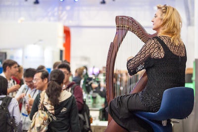 The sweet sounds of a Celtic harpist resonated across the exhibit hall at the WMIC.