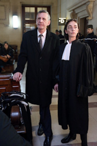 Dr. Michel Aubertel waits for the verdict in Paris. Image courtesy of Agence France-Presse/Getty.