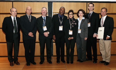 ECR 2013 President Dr. José Bilbao (left) with Dr. Zarina Lockhat (fourth from the right) and her colleagues from South Africa during Saturday’s session. Image courtesy of the European Society of Radiology.