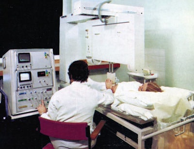 The one ton (1,016 kg) diasonograph machine was sometimes known as the 'dinosaurograph.' The heavy gantry was important because of the need for a stable scanning platform. This photo was taken in 1972.