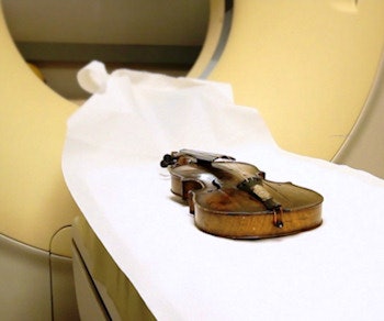 The violin in question undergoing a CT scan to authenticate its origins.