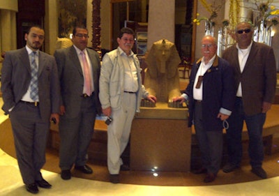 Dr. Jan Labuscagne and ISR's past President Dr. Nicholas Gourtsoyiannis (to right of statue) made a site inspection to Egypt in January 2011. They met the local organizers, including Dr. Emad Naguib (chairman of ICR 2014 Organizing Committee), who is shown on the right. Image courtesy of Walid Menessi, Icom, Alexandria, Egypt.