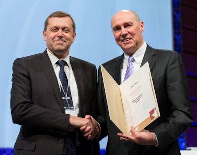 Lectures should be a balancing act of correct but accessible science, fun, and good timing, according to Dr. Paul Parizel (right), pictured here with ECR 2014 President Dr. Valentin Sinitsyn, PhD. Image courtesy of the European Society of Radiology.