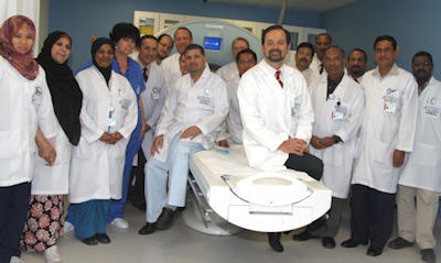 Expat radiologists should be willing to adapt to existing professional culture, be gentle, diplomatic, and patient, according to Dr. Michael Fuchsjäger, pictured here with his radiology team during his tenure as chair of radiology at Al Ain Hospital. Image courtesy of Dr. Michael Fuchsjäger.