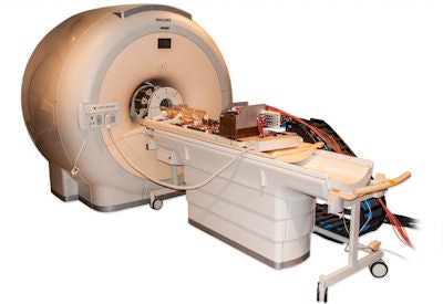 The PET/RF insert mounted on the patient table of a clinical 3-tesla MRI system.