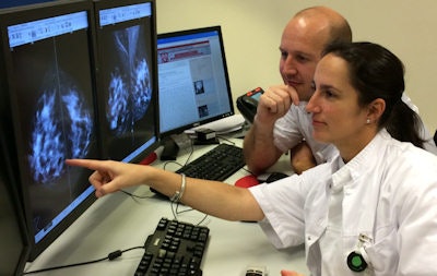 Young radiologists should subspecialize early to ensure that deep knowledge of their discipline keeps them ahead of the game, said RTF Chair Dr. Viola Koen, shown here discussing a breast case with a radiographer colleague.