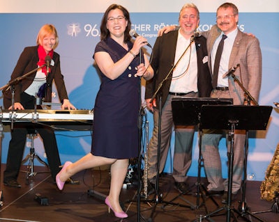 Let's dance! The congress organizers and DRG staff entertained delegates at the meeting. From the left are Rebecca Lefers from Interplan Congress, Meeting and Event Management, Ulrike Schiedt from the DRG, Bruno Lichtinger from Interplan, and Dr. Stefan Lohwasser.