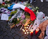 French flag and flowers for the Paris attacks.