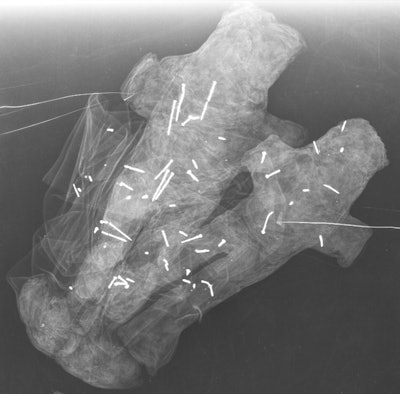 Doll pair made of black and white fabric.