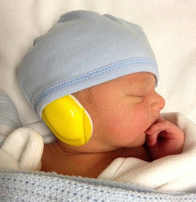 The babies wore special earmuffs to protect them from the noise of the scanner. Image credit: Lucinda Winckworth.