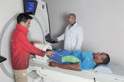Dr. Marcelo Patricio (left), deputy chief medical officer for Rio 2016, oversees an MRI examination being performed on the Brazilian canoe sprint athlete Edson Freitas da Silva. He is assisted by Wallace do Amaral, a clinical application specialist from GE Healthcare. All photos courtesy of GE Healthcare.
