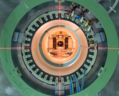 Looking down the split bore of the collaboration's second system, currently an inline arrangement. Objects are placed in the split perpendicular to the bore and photon beam. The geometry also allows the beam to be fired down the split, perpendicular to the B0 field. A copper RF screen is placed in front of the linac during imaging and irradiation.