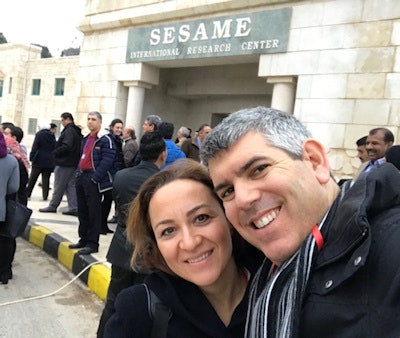 Roy Beck shown outside the SESAME facility with fellow user-group member and solid-state physicist Ă–zgĂĽl KurtuluĹź from Turkey, who starts work as a research scientist at the University of Siegen in Germany in January 2017.