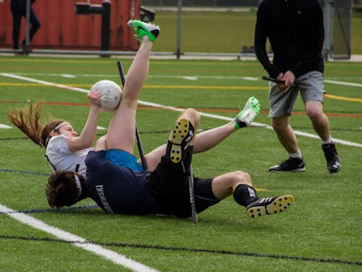 Many injuries result from tackles and falls. Photo by Julie Mary.