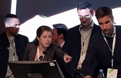 'Dr. Fides Schwartz pictured here (center, pointing), taking part in a residents and fellows radiology quiz at JFR on Friday with two Swiss colleagues, alongside teams from France and Algeria.