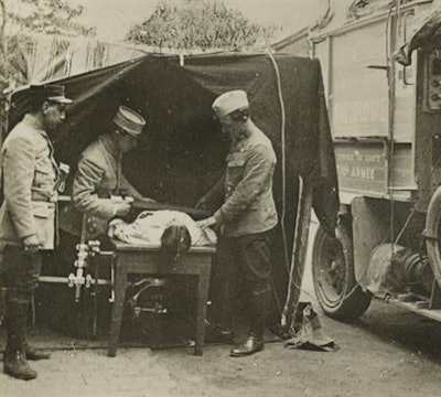 Medics at a French WWI field hospital locating a bullet with an x-ray machine. Image from the Library of Congress.