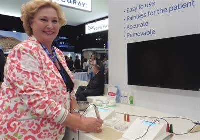 Medical Precision's CEO Annelies Maas demonstrates the painless tattooing system.