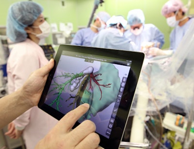 The Mobile Liver Explorer iPad app in use during a liver operation at Yokohama City University Hospital.