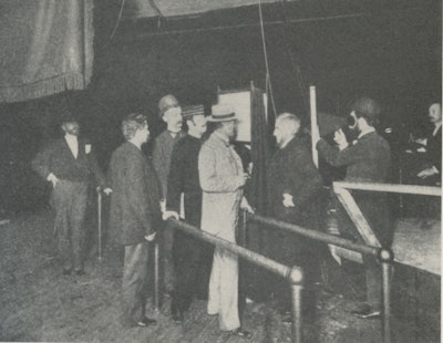 At Edison's fluoroscopic exhibition in New York City in May 1896, Dally can be seen on the extreme right-hand side.