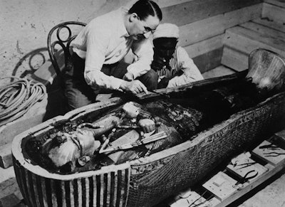 Howard Carter and an Egyptian workman examining the third coffin of Tutankhamun made of solid gold (1925). All images courtesy of Dr. Adrian Thomas.