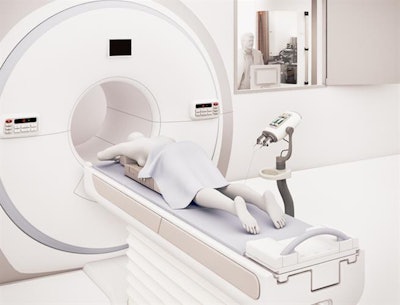 The scanner room showing a patient positioned in the MR scanner and the SPINlab hyperpolarizer in the room next door.