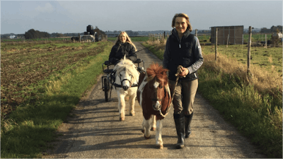 Giddy-up! Dorothea with Christiane and the Shetland ponies.