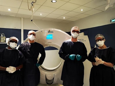 Are medical imaging staff in private hospitals as valued and praised as colleagues in public hospitals? These radiographers work at Centre d'Imagerie Paris-Nord, Sarcelles. From left to right: Thierry, Benoît, Damien, and Hassina. Image courtesy of Dr. Robert Lavayssière.