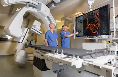 Interventional neuroradiologists Dr. Gerald Wyse and Dr. Noel Fanning with the Artis icono system at Cork University Hospital. Image courtesy of Siemens.