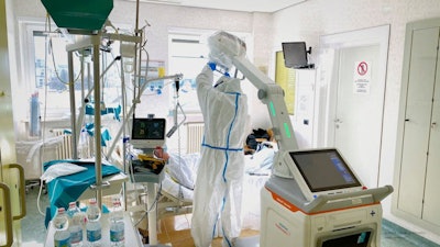 This photo from a hospital in South Tyrol, Italy, shows the level of care and protection now required by a radiographer to perform a normally straightforward x-ray examination. All photos courtesy of the IDoR.