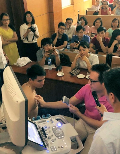 Dr. George Koulouris, a sports and musculoskeletal radiologist at Melbourne Radiology Clinic, gives a hands-on teaching session in Hanoi, Vietnam.