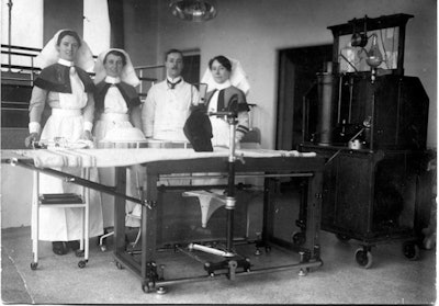 Mobile x-ray unit with Ironside Bruce and nursing staff during World War I.