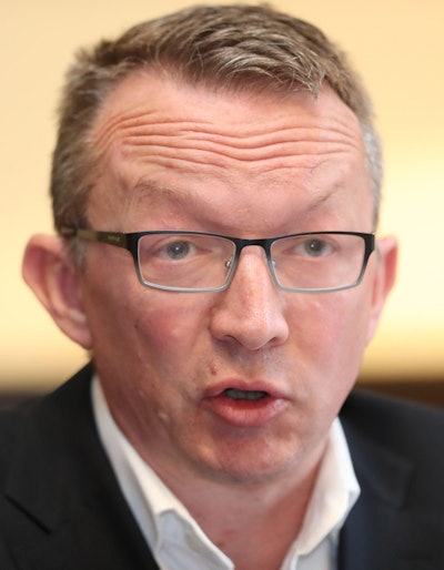 Dr. Colm Henry. Courtesy of PA Images / Alamy Stock Photo.