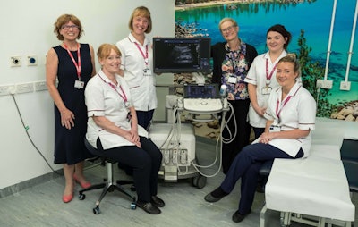 Before COVID-19, there were many more smiling faces around in the pediatric radiology department at Nottingham Children's Hospital. From right to left: radiographers Lauren Padgett and Clare Cormell, consultant paediatric radiologist Dr. Kath Halliday, radiographers Angela Staley and Vanessa Waspe, and ultrasound applications specialist Jackie Chambers. Photo taken in August 2018, courtesy of Canon.
