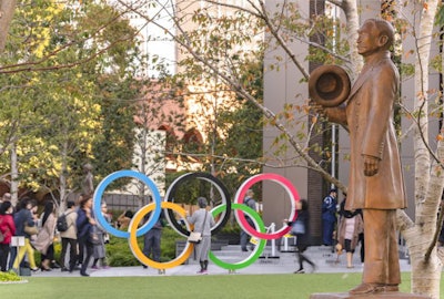This statue of the founder of judo, Kano Jigoro, is located in front of the Olympic Rings Monument at the Japan Olympic Museum. Jigoro was the first Asian member of the International Olympic Committee. Photo courtesy of Kuremo / Adobe Stock.