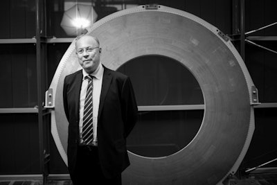 Dr. Denis Le Bihan, PhD, in front of one of the so-called double pancakes. Image courtesy of CEA-Paris-Saclay, T. Paviot/CEA.