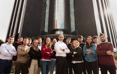 Angel Alberich-Bayarri, PhD, and some of the Quibim team outside the company's offices in Valencia, Spain.