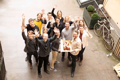 The team at Radiobotics celebrate the news of their award with a special cake.
