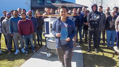 Employees at Hyperfine proudly display their EuroMinnies trophy.