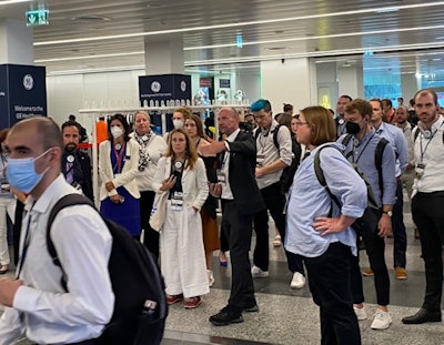 Peter Baierl (middle) has worked as executive director of the ESR since the first ECR took place at the Austria Center in 1991. This photo was taken on the first morning of ECR 2022, when he was on hand to help and direct attendees.