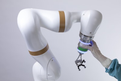 The robotic arm of the surgical robotics platform.