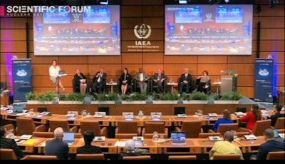 Panelists and attendees at the IAEA's Scientific Forum discuss increasing global radiotherapy capabilities on 27 September in Vienna.