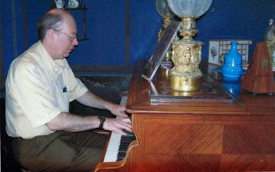 Prof. Denis Le Bihan is a keen musician. Here he is playing on Ravel's piano.