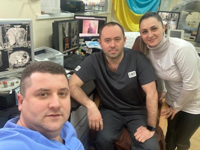 The reading room at Zaporizhia Regional Hospital. From left to right: Dr. Olexandr Davydov, Dr. Andrii Makarenkov, and technician Anna Pustilnik.