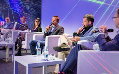 Piotr Krajewski (center) participated in a panel discussion at the 'Made in Wrocław: Driven by Intelligence' conference in October 2021. The event is organized every five years by the City of Wrocław and Wrocław Agglomeration Development Agency.