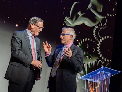 Ó Laoide enjoys a conversation with Prof. Adrian Brady during ECR 2023.