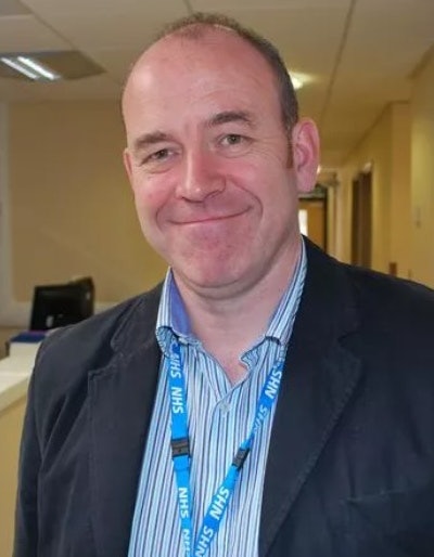 Dr. John Curtis, after receiving the RCR training award in 2014. Photo courtesy of Liverpool Echo.
