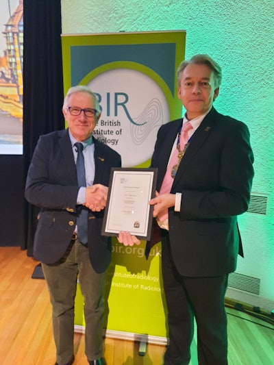 Prof. Adrian Brady receives the Godfrey Hounsfield Award from BIR President Prof. Stephen Keevil.