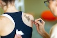 Tattoos are a potential hazard in MRI. Image courtesy of Zsolt Repasy/Alamy Stock Photo.